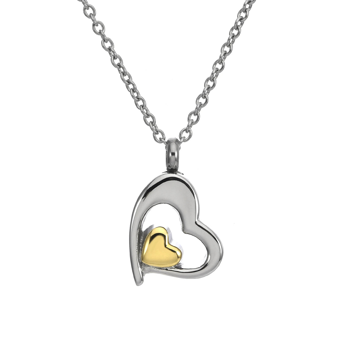 Heart-shaped pendant with gold heart inside on a silver chain against a white background