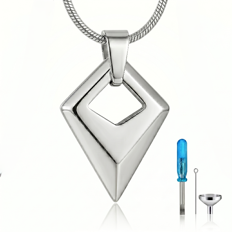 Prism of Love Cremation Necklace – polished silver stainless steel diamond-shaped memorial pendant measuring 25mm x 18.2mm, shown with filling funnel and screwdriver tool kit on white background.