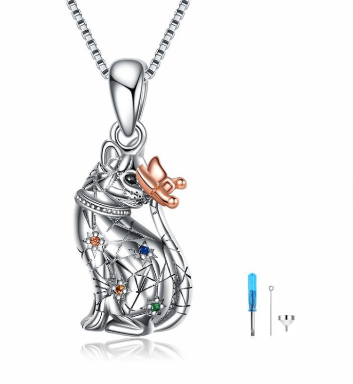 Sterling silver cat urn pendant with rose gold butterfly and colored crystals, shown with funnel and screwdriver fill kit