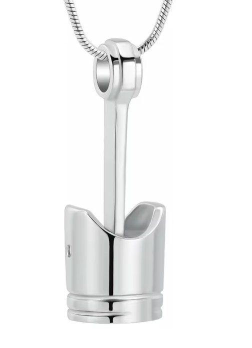 Minimalist silver cremation pendant necklace designed to hold a small portion of ashes, shown on a chain with a smooth polished finish and discreet memorial design.