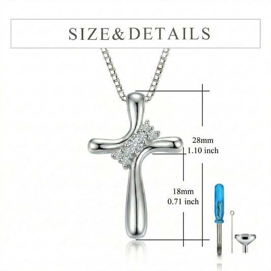 Size and details of Grace Eternal Crystal Cross Cremation Necklace in 925 sterling silver showing pendant dimensions of 28mm height and 18mm width (1.10 x 0.71 inch), displayed with silver box chain and filling kit tools.