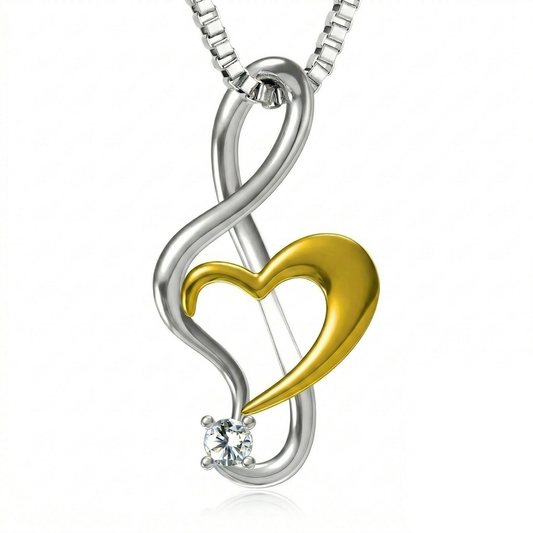 Sterling silver infinity treble clef pendant with a gold heart and crystal accent
