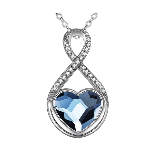Sterling silver infinity pendant with a faceted blue crystal heart and cubic zirconia accents