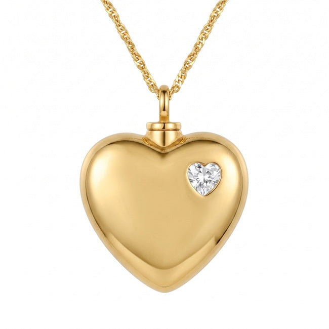 Radiant Heart cremation pendant in gold with a heart-cut crystal accent and screw-top bail on a gold chain
