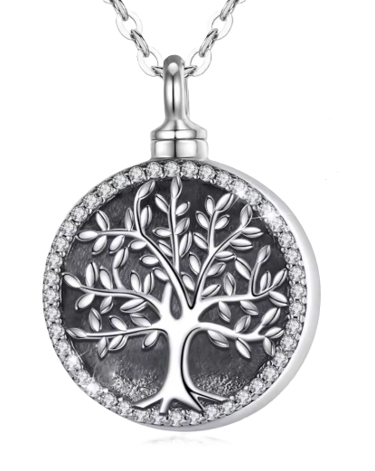Silver circular Tree of Life memorial urn pendant with crystal border and filling funnel kit on white background.